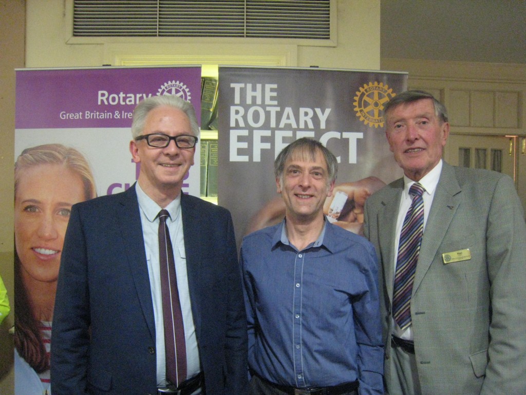 Johan Williams office manager, Alan Franklin Cambridge South Rotary President who presented the cheques and Alan Edwards.